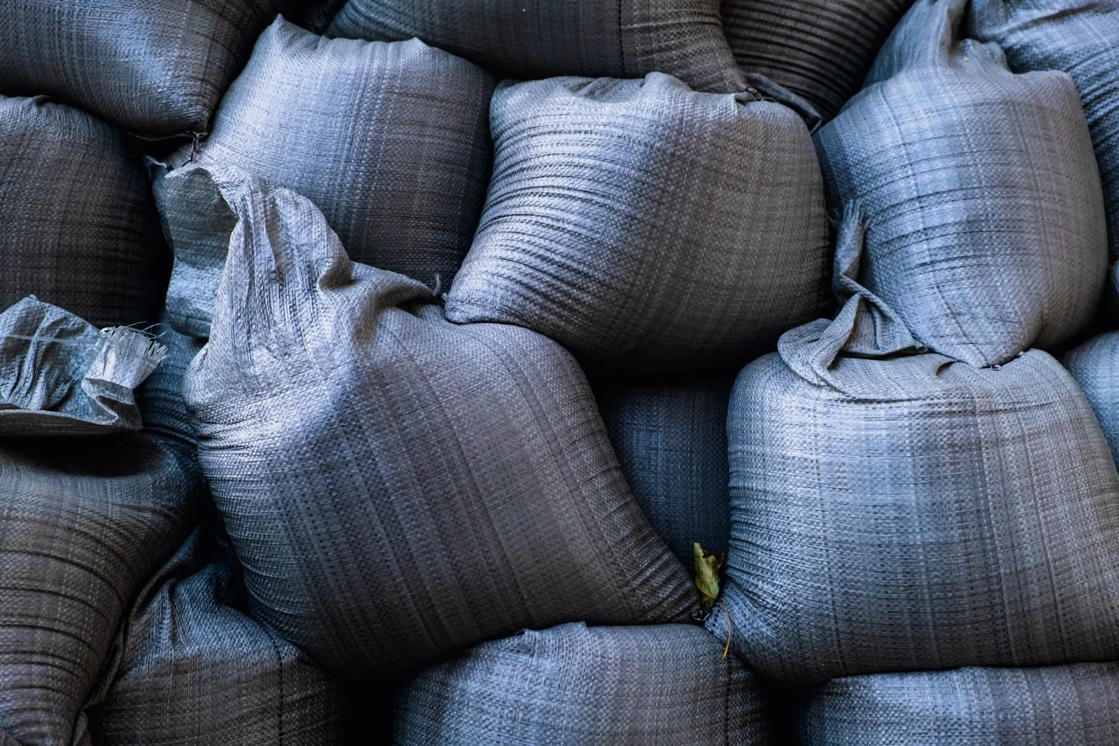 Close-up of stacked sandbags for flood protection